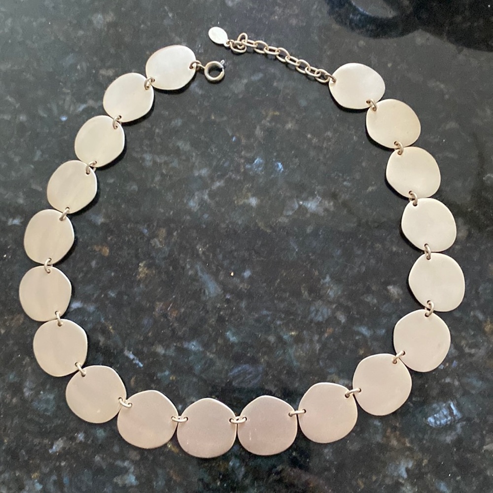 Gold tone necklace.